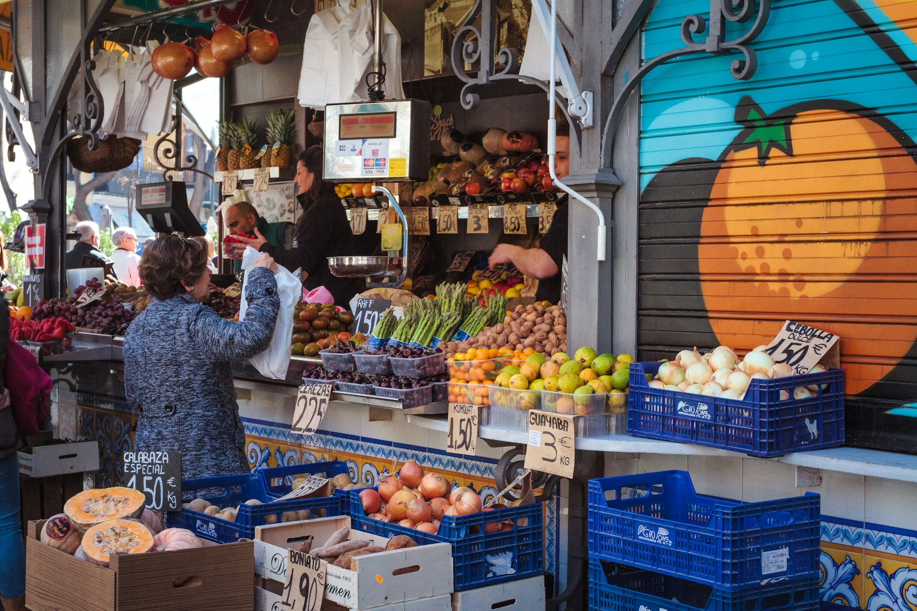 Fresh fruit stalls inside a Valencia market